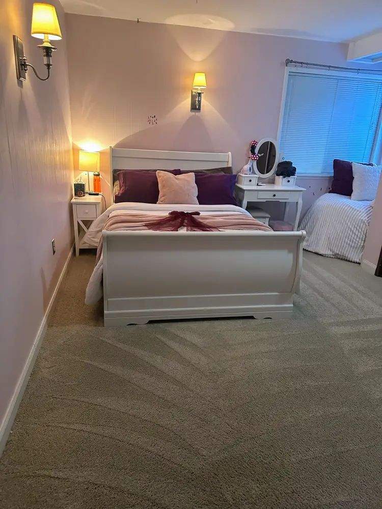 Bedroom with freshly vacuumed carpet