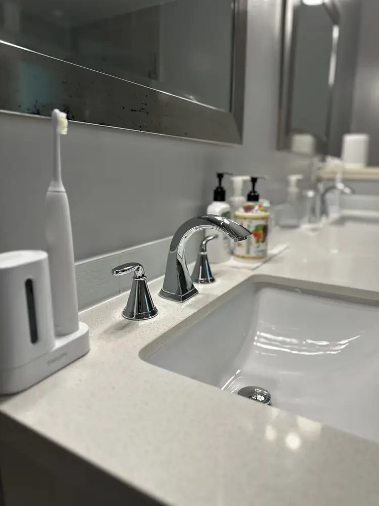 Polished bathroom faucet and counter